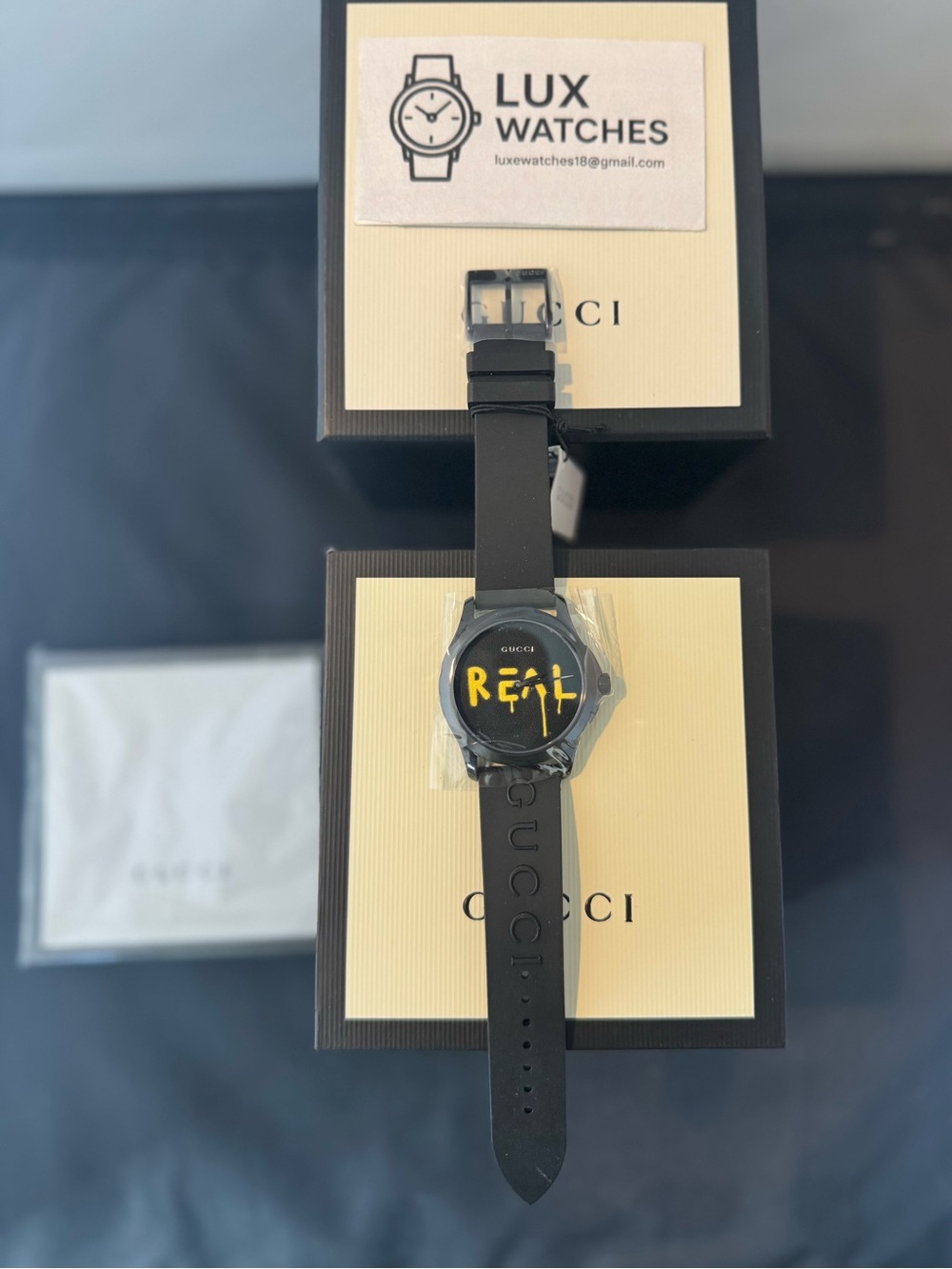 Gucci Black Watch with Yellow "Rêal" Dial